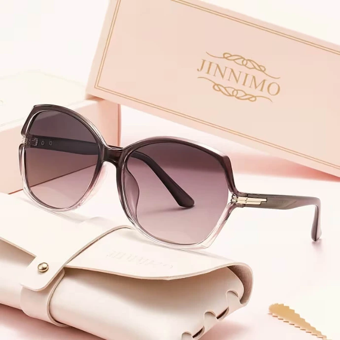Elegant oversized gradient-lens sunglasses presented in a JINNIMO branded pink gift box.